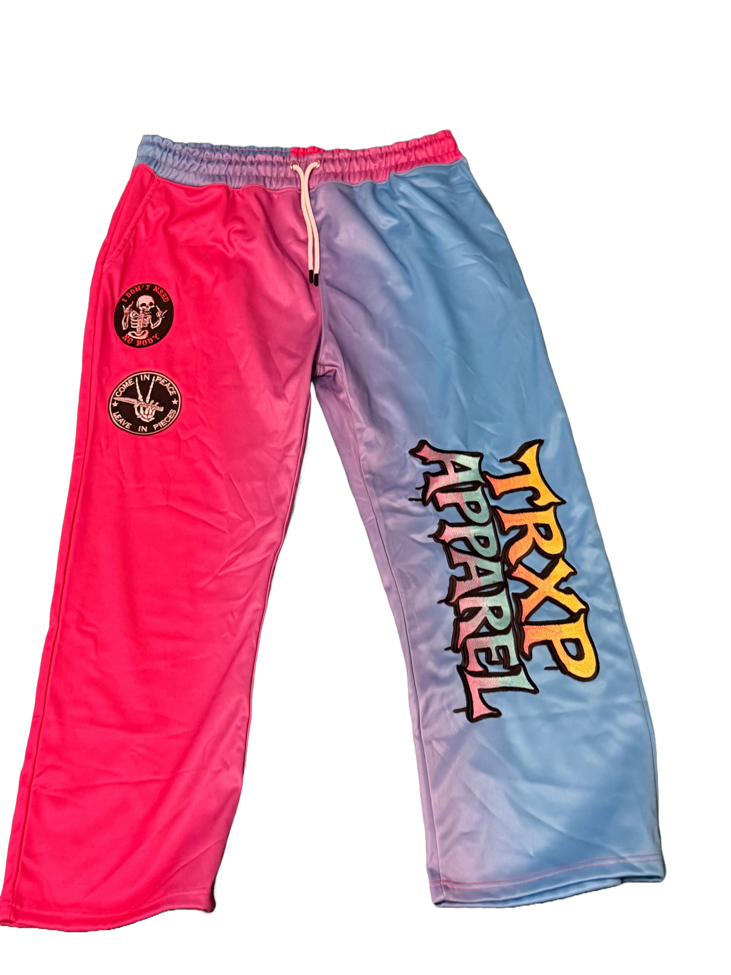 Man and woman wearing TRXP Apparel streetwear tracksuit sweatpants - urban fashion 2026